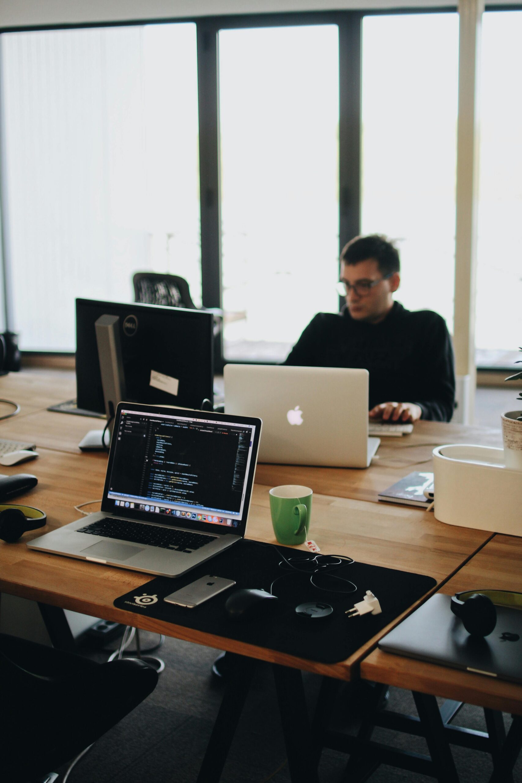 man sitting at a desk